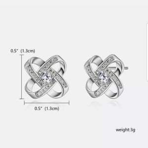 New silver toned CZ ear stud earrings halo flower